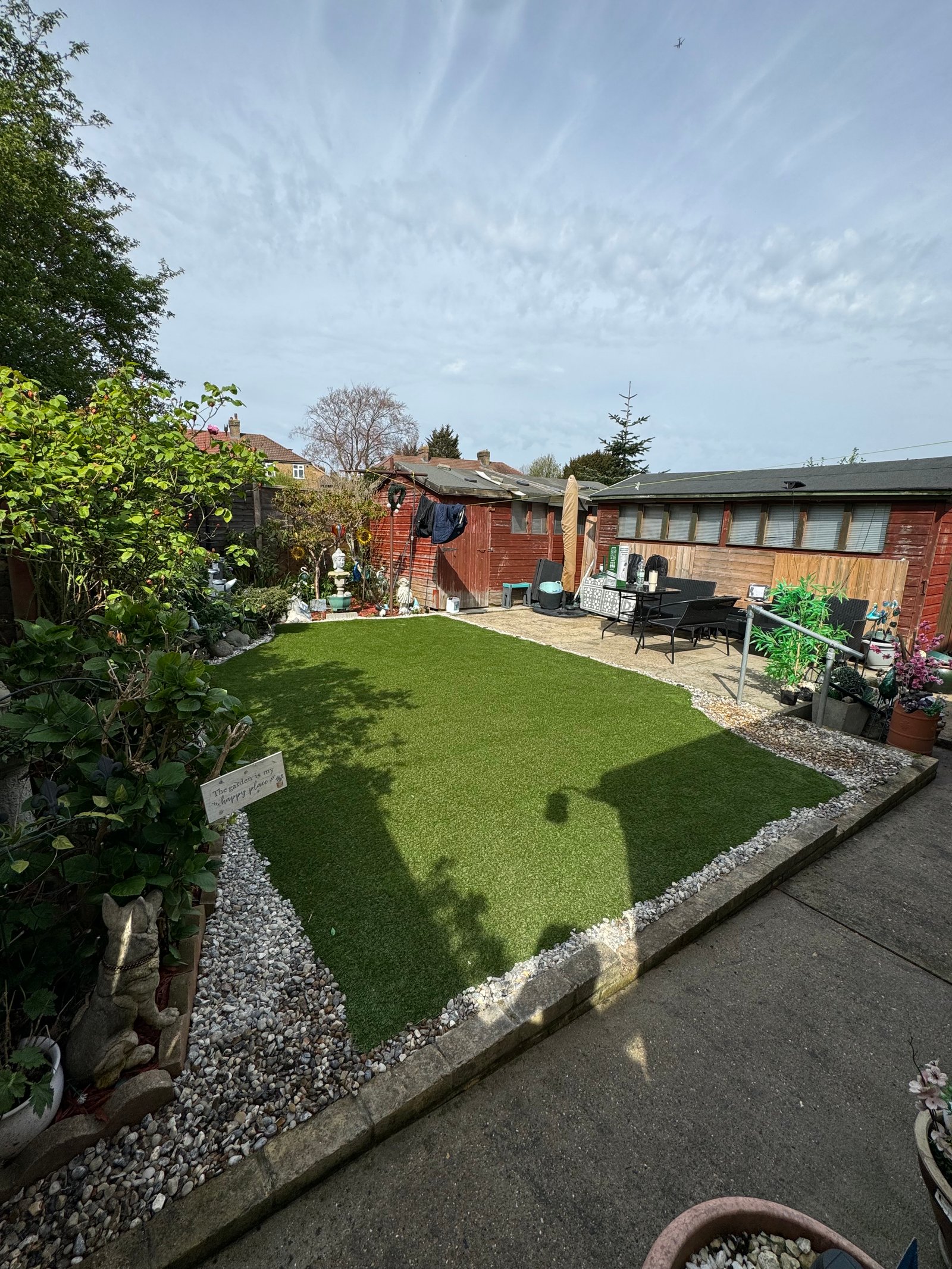 Artificial grass installation in a residential garden