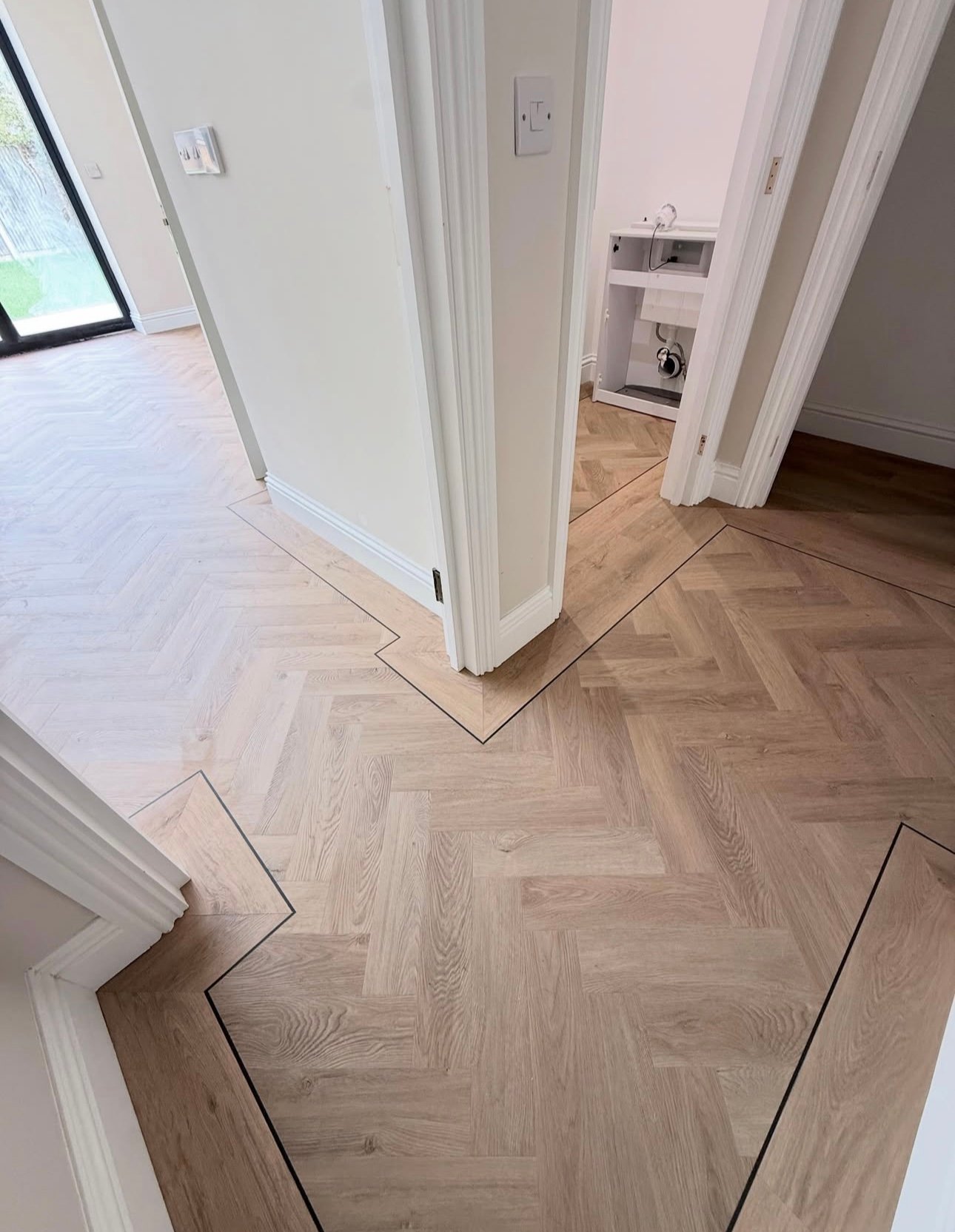 Coordinated flooring and decoration in a completed Battersea home improvement project