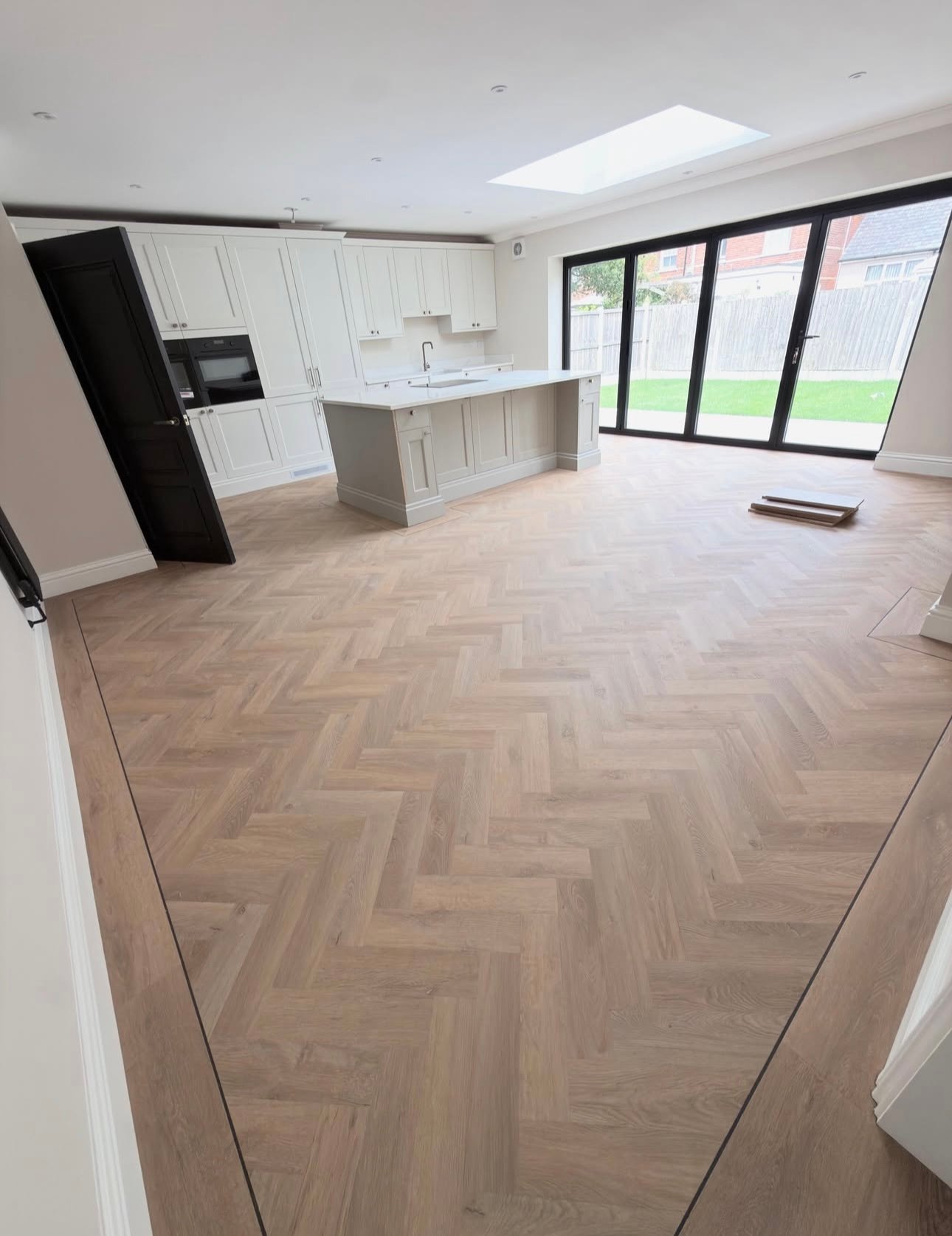 Herringbone flooring fitted as part of a Battersea interior refurbishment