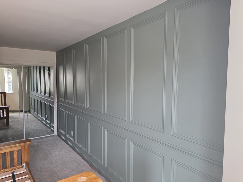 Interior woodwork and finishing repairs in a rental property